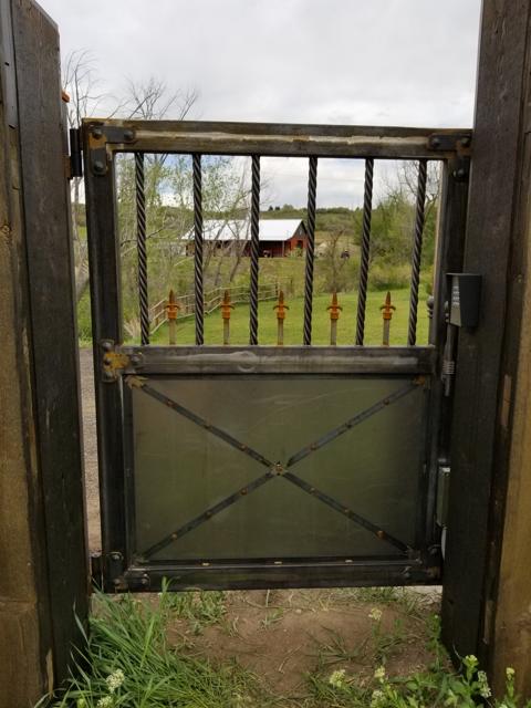 Steel pedestrian walk gate with mesh infill