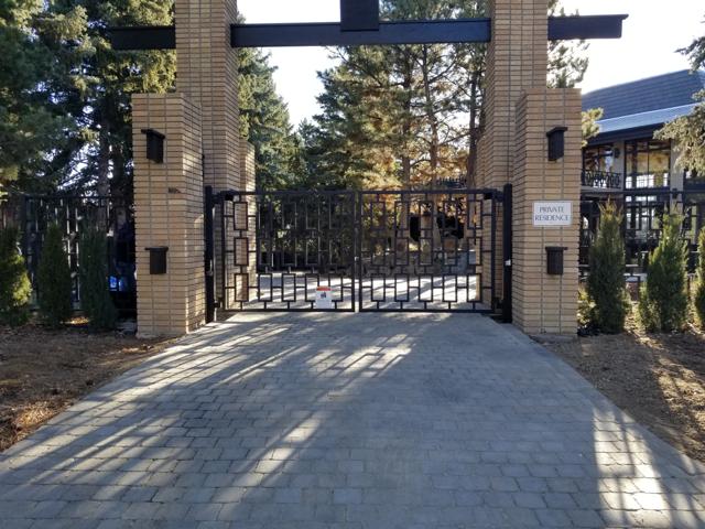 Ornamental gate at a brick private residence