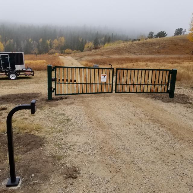 Steel-framed wood slat ranch gate
