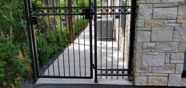 Ornamental walk gate with stone columns