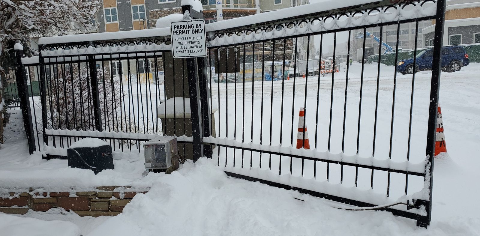 Ornamental gate damaged in winter