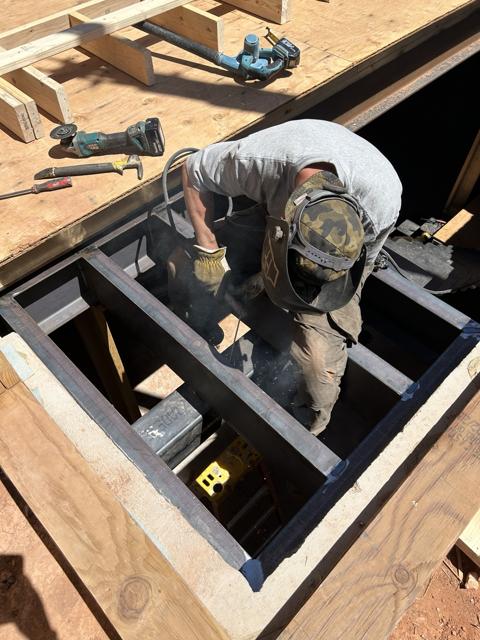 Welding a cattle guard frame on site